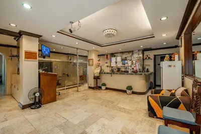 a large room with a store with atainment sqor at Hotel Juliano in Manila