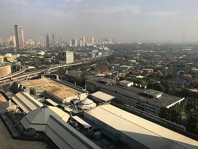 an aerial view of a city with buildings andrastructure at Holiday Inn & Suites Manila Galleria by IHG in Manila