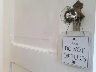 a sign that says please do not disturb hanging on a door at Charming La Casita Mercedes, 5Br and 5TB for Family and Friends Staycation- Read Listing Info in Manila