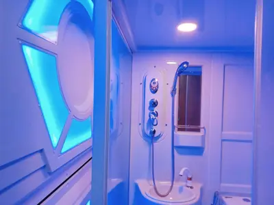 a bathroom with a shower and a sink at 8Hostel in Manila