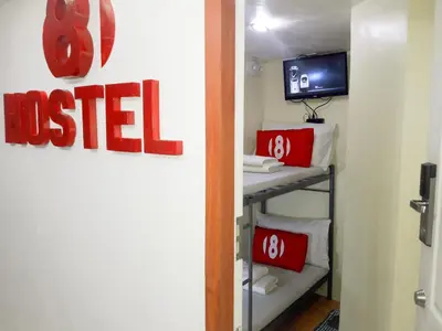 a room with a sign that reads installed in a room at 8Hostel in Manila
