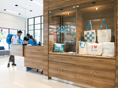 a store with a counter with bags on it at Hop Inn Hotel Ermita Manila in Manila