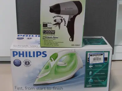 a box with a green hair dryer in it at All At Jazz - Makati Serviced Apartments in Manila