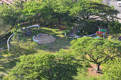 an aerial view of a park with a playground at Eton Parkview in Manila