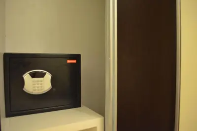 a small television sitting on a shelf in a room at Eton Parkview in Manila