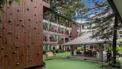 an external view of a building with a gazebo at Selah Garden Hotel Manila in Manila