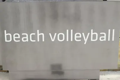 a sign with the words beach volleyball on it at Azure Tropical Paradise in Manila