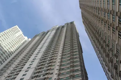 a tall building looking up at the sky at Affordable Makati Serviced Apartments in Manila