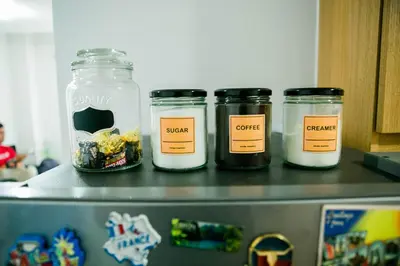 a group of three jars on top of a refrigerator at Salem's Abode in Manila