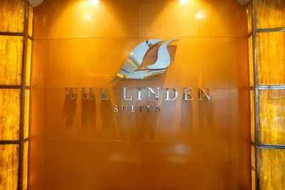 a sign for the linden suites hotel at The Linden Suites in Manila
