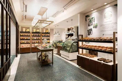 a bakery with a variety of pastries on display at Edsa Shangri-La, Manila in Manila