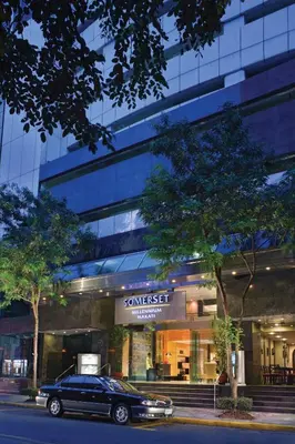 a car parked in front of a building at Somerset Millennium Makati in Manila
