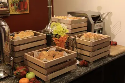 a group of boxes of food on a counter at The Malayan Plaza Hotel in Manila