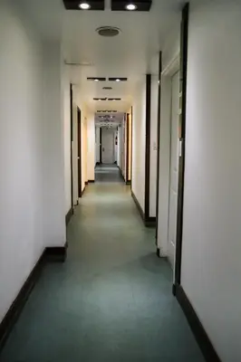 an empty hallway in an office building at Eurotel Pedro Gil in Manila