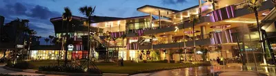 a large building with lights in front of it at Luxury Condo-Princeton Residence-New Manila Quezon City-Fast Wi-fi150mbps in Manila