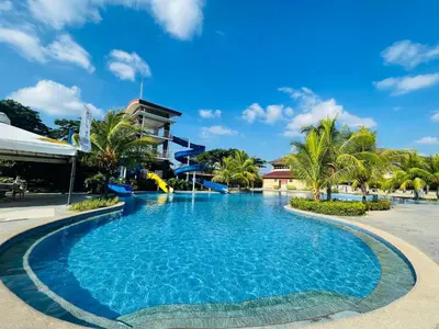 a pool at the resort at Aquamira Hotel & Resort in Tanza