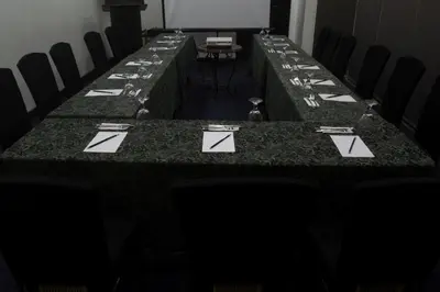 a long table with chairs in a room at El Cielito Inn - Sta. Rosa in Santa Rosa