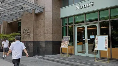 a man walking in front of a nordos store at KL Executive Greenbelt (KLX) in Manila