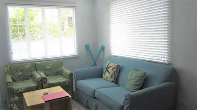 a living room with a couch and two chairs at Homestay at 24 Laguna Bel-Air by Red Door House Rental in Santa Rosa