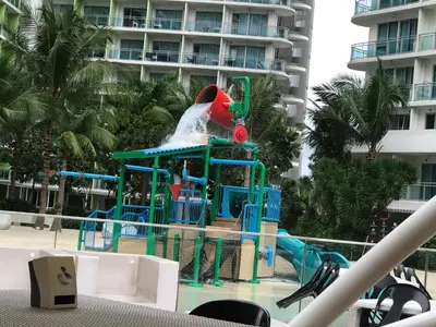 a water park at a resort with a water slide at Joanne Sweet Home in Manila