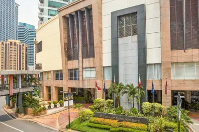 a building in the middle of a city at Eastwood Richmonde Hotel Quezon City in Manila