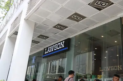a store front of a jaxbury sign on a building at One Palm Tree Villas MANILA in Manila