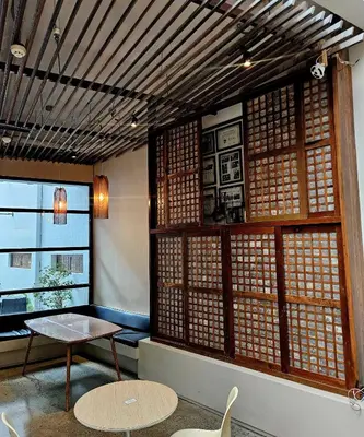 a room with a table and a window at Monchere Dormitory in Manila
