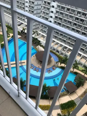 an aerial view of a large apartment complex with a pool at BEST Q CONDO w/ Great View in Manila