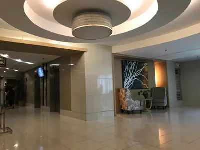 a lobby with a circular ceiling in a building at BEST Q CONDO w/ Great View in Manila