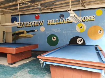 a room with a pool table and balls on the wall at Riverview Resort and Conference Center in Calamba