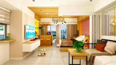 a living room with a couch and a table at Holiday Escape Philippines in Manila