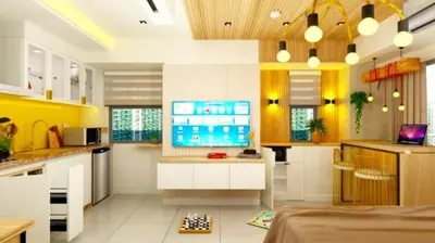 a kitchen with a flat screen tv on a counter at Holiday Escape Philippines in Manila