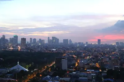 a view of a city at night at 2-story Penthouse with 5 Balconies in Manila