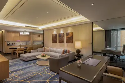a living room with a couch and a table at Hilton Manila Newport World Resorts in Manila