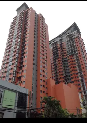two tall apartment buildings in a city at Portovita Towers in Manila