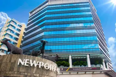 a statue in front of a new harbour building at Savoy Hotel Manila near Airport NAIA Terminal 3 MNL in Manila