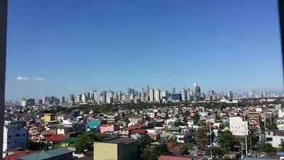 a large city with buildings in the background at 150 Newport City Condo - near NAIA T3 AIRPORT MANILA in Manila