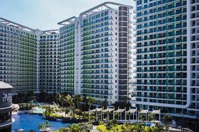 a view of a large building with many windows at Azure C7 Balcony, Wifi, Near Mall Airport in Manila