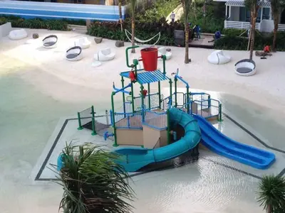 a playground with a slide in the water at Azure Urban Resort Maui Unit in Manila