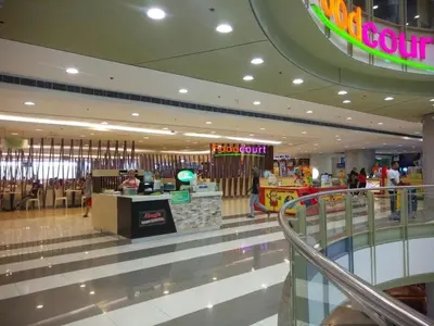 a shopping mall with a food court and a store at 2BR avida tower near NAIA airport in Manila