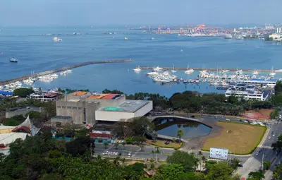 an aerial view of a harbor with boats in the water at Lotus Residence, Manila in Manila