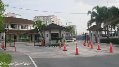 a group of orange cones on a street at Genesis unit SMDC Fields in Manila