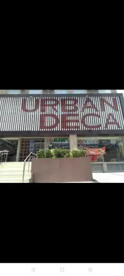 a building with red and white signs on it at Urban Deca Tower @ Graceysplace Unit 4 Mandaluyong in Manila