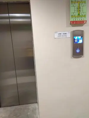 a metal elevator with a sign on a wall at Urban Deca Tower Graceysplace Unit unit 3113 Mandaluyong in Manila