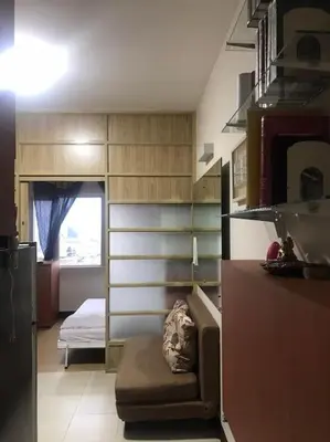 a small room with a bedroom with a bed at Condotel Type in Manila