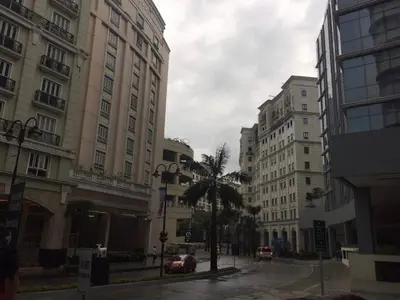 a street in a city with tall buildings at 101 Newport City near NAIA 3, Pasay City in Manila