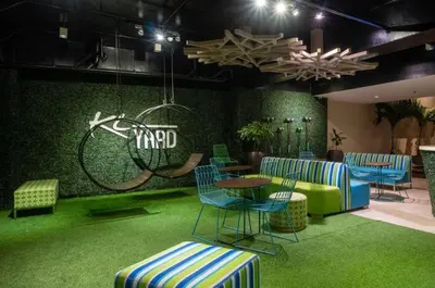 a lobby with chairs and tables and a sign that readsfind at KL Tower Makati Apartments by PH Staycation in Manila