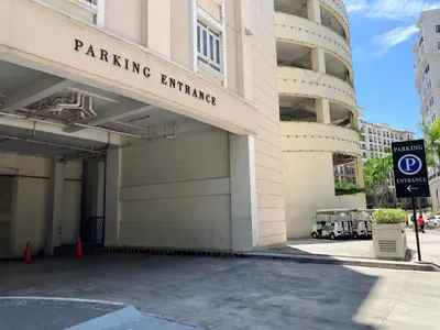 a parking garage on the side of a building at Chillax Studio 101 Newport Boulevard in Manila