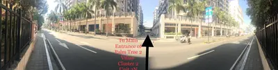 a view of a city street with buildings and a sign at Palm Tree 2 Villas-Cluster 2 Unit 3N in Manila