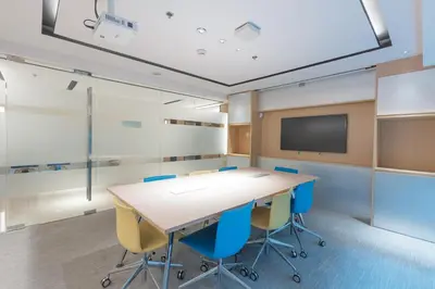 a conference room with a table and chairs and a tv at Holiday Inn Express Manila Newport City by IHG in Manila